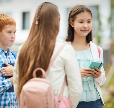 Children looking at tablet during consultation